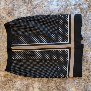 Knee length skirt with slit in back